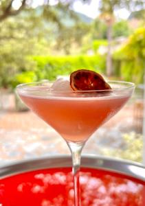 a margarita with a leaf in a martini glass at Hôtel de la Corniche in Bastia