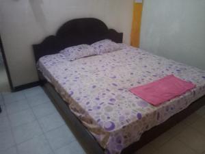 Uma cama ou camas num quarto em Casa Minha Backpackers Hostel