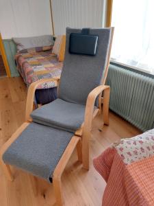 Predel za sedenje v nastanitvi Per-Sims