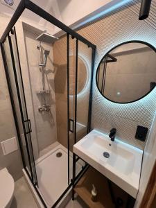 Kúpeľňa v ubytovaní Franciszkanska Blueberry Apartment
