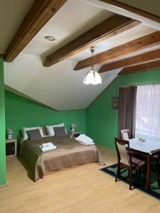Postel nebo postele na pokoji v ubytování Hotel Jerevan