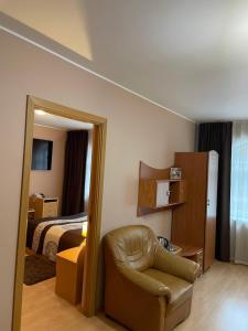 Postel nebo postele na pokoji v ubytování Hotel Jerevan