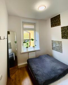 Posteľ alebo postele v izbe v ubytovaní Cristal Apartament Krynica - Zdrój