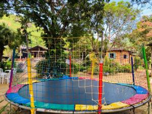 ein großes Trampolin auf einem Spielplatz in der Unterkunft Ferrari Casa Nostra in Santa Teresa