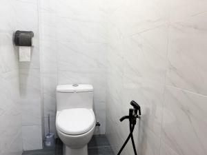Koupelna v ubytování Inang Street Stay - Cheng Business Park + 18 fotografií