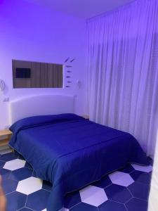 Postel nebo postele na pokoji v ubytování Hotel Vietri Coast