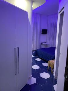 TV a/nebo společenská místnost v ubytování Hotel Vietri Coast