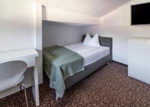 Postel nebo postele na pokoji v ubytování Hotel Pension Waldesruh