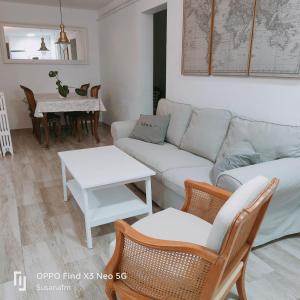 a living room with a couch and a table at Marinela in Hendaye