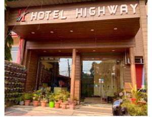 a hotel highway sign on the front of a store at Hotel Highway, Udhampur in Udhampur