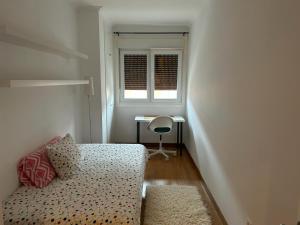 Giường trong phòng chung tại Barrantes - Piso de lujo cerca de Sanxenxo +7 ảnh