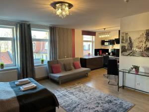Posezení v ubytování Apartamenty EDK + 26 fotografií