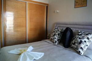 Ένα ή περισσότερα κρεβάτια σε δωμάτιο στο Le Rocher De L'Atlas