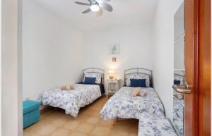 A bed or beds in a room at Villa Amistad