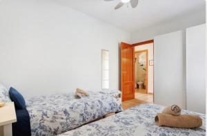A bed or beds in a room at Villa Amistad Még 25 kép