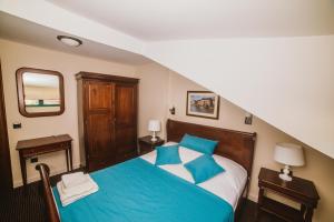 Letto o letti in una camera di Hotel Astoria