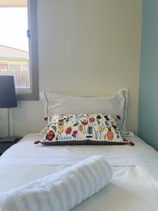 YF Home Sweet Home客房内的一张或多张床位