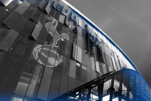 a building with a reflection of a picture on the side of it at London Tottenham Stadium Apartment in London