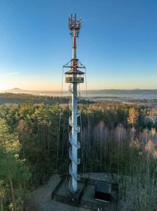 an observation tower in the middle of a forest at Zlatý apartmán v soukromí Malá Skála Český Ráj in Koberovy