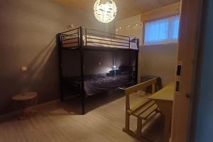 Ένα ή περισσότερα κρεβάτια σε δωμάτιο στο Maison - Les Loges de St-Claude