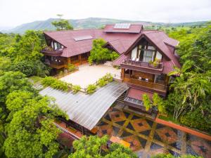 an aerial view of a house with solar panels at Phu Pha Nam Resort in Dan Sai