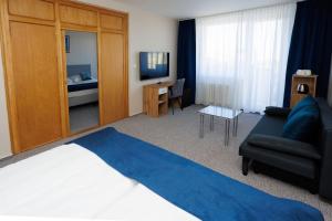 Rúm í herbergi á Hotel FIT