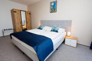 Rúm í herbergi á Hotel FIT