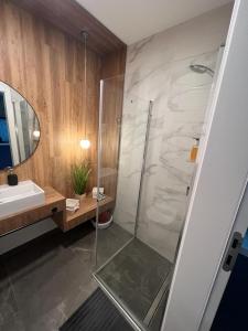 Ett badrum på Jantaris Mielno A13
