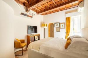 A bed or beds in a room at Giulia Luxury Suite