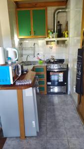 Køkken eller tekøkken på Alojamiento Nestor Tacuari