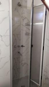 Et badeværelse på Alojamiento Nestor Tacuari