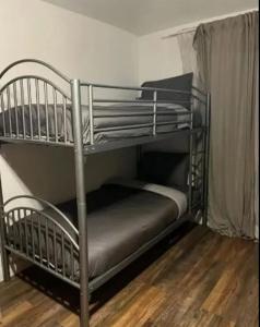 a couple of bunk beds in a room at Douglas's House in Dublin