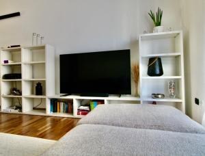 TV a/nebo společenská místnost v ubytování Medaglie d'oro