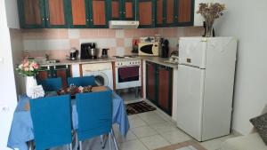Kuchyň nebo kuchyňský kout v ubytování Old House