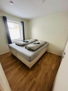 Cama o camas de una habitación en Nydelig perle ved Tyrifjorden