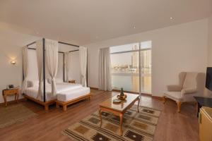 Voodi või voodid majutusasutuse Riverside Hotel toas