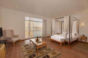 Voodi või voodid majutusasutuse Riverside Hotel toas