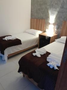 Cama o camas de una habitación en Hotel Da Orla