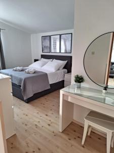 Postel nebo postele na pokoji v ubytování Sunshine Apartment Sovlje