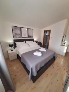 Postel nebo postele na pokoji v ubytování Sunshine Apartment Sovlje