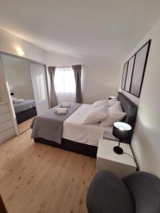 Postel nebo postele na pokoji v ubytování Sunshine Apartment Sovlje