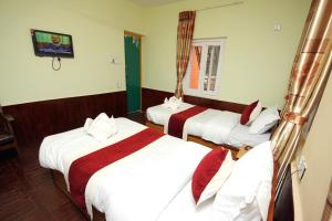 Postel nebo postele na pokoji v ubytování hotel Backpackers inn