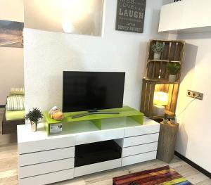 Televiisor ja/või meelelahutuskeskus majutusasutuses Haus Rabensteiner