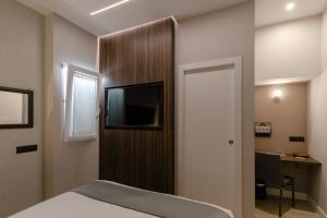 TV a/nebo společenská místnost v ubytování Aiello Hotels - Centrale