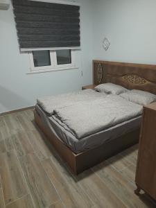 Katil atau katil-katil dalam bilik di Family apartment PePa Dürres