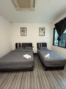 Postel nebo postele na pokoji v ubytování KIWI INN + 37 fotografií