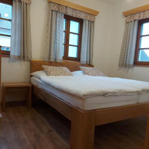 Postel nebo postele na pokoji v ubytování Apartmány Marie Albeř + 37 fotografií