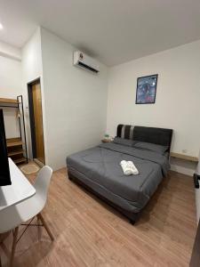Postel nebo postele na pokoji v ubytování KIWI INN