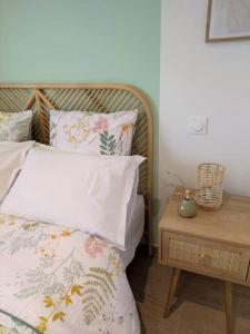 Postel nebo postele na pokoji v ubytování Le COCON, appartement moderne et cosy