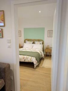 Postel nebo postele na pokoji v ubytování Le COCON, appartement moderne et cosy
